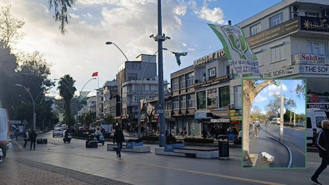 Şiddetli rüzgar bayrak takılı direği yola serdi