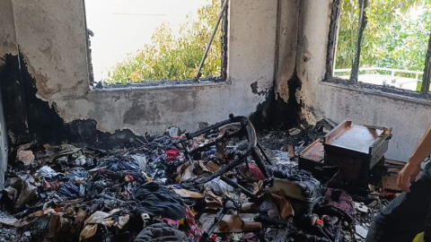 Yanan evdeki kediyi itfaiyeciler kurtardı