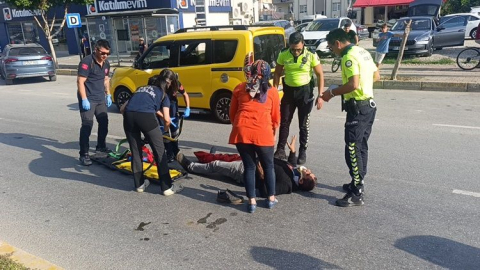 Devrilen motosikletteki 2 kişi yaralandı