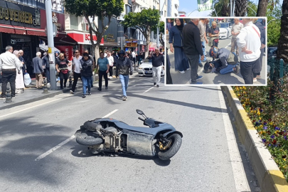 Motosiklet sürücüsü devrilen motoruyla 20 metre sürüklendi